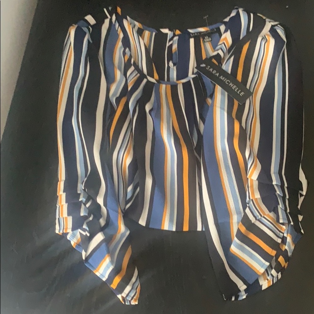 A loose fitting long sleeve blouse